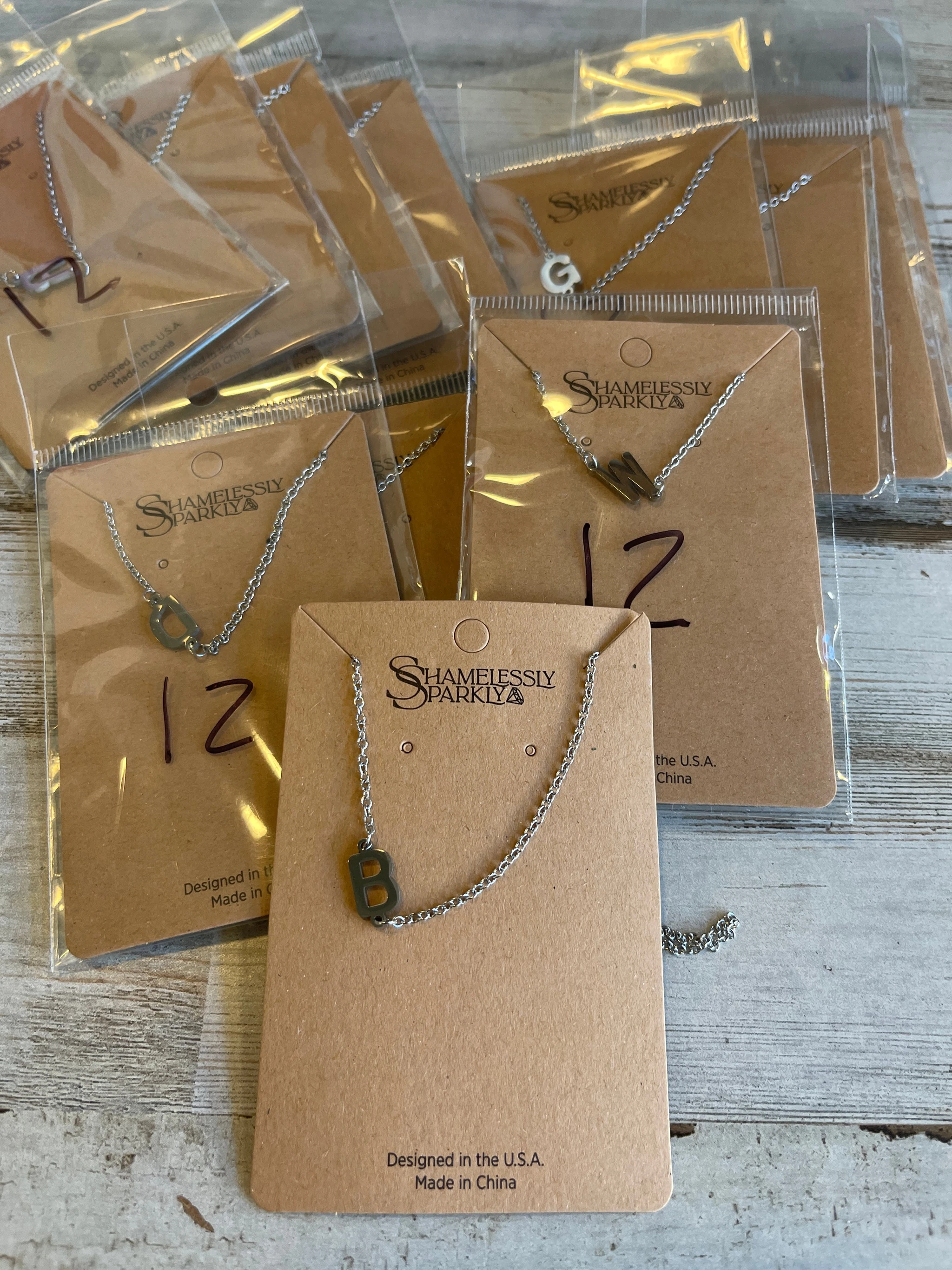 Initial necklaces